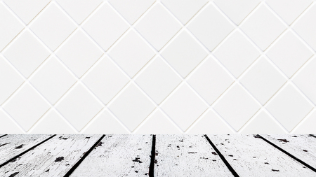 background made of white wooden floor and white rhomboid mosaic wall in rectangle formの写真素材