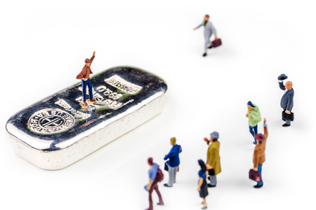 man standing on silver brick with victory gesture with the audienceの写真素材