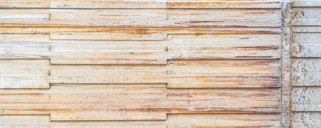 closeup of grey concrete wall with lineal parts, vertical lines