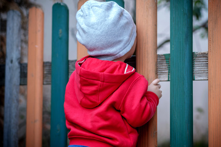 one year old boy discovering the world aroundの写真素材