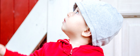 one year old boy discovering the world aroundの写真素材