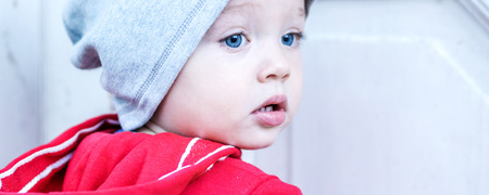 one year old boy discovering the world aroundの写真素材