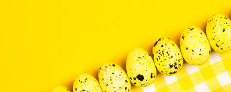 easter abstract gift card on yellow and white textured background with yellow easter eggs laying in...
