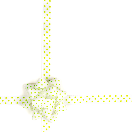 gift card textured background with green bow in the middle and green and white stripes in square form with plenty copy space for the textの写真素材