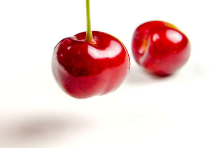 red cherries on white background isolatedの写真素材