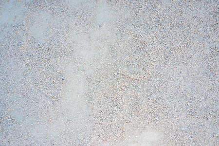 sidewalk made of grey and white very small gravel parts typical for castle gardensの写真素材