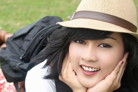 a happy woman in a public park の写真素材