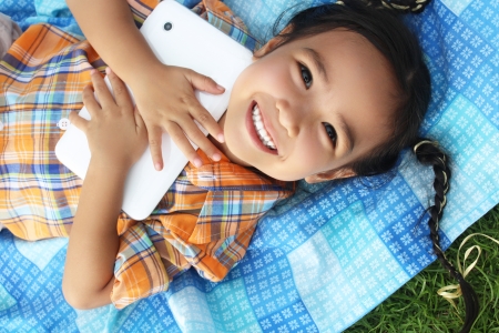 little girl in the parkの写真素材