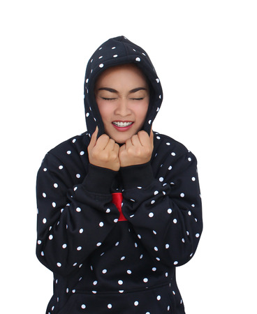 Close up of a beautiful woman smile wearing winter clothing isolated on a white backgroundの写真素材