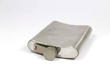 Hip flask isolated on white の写真素材