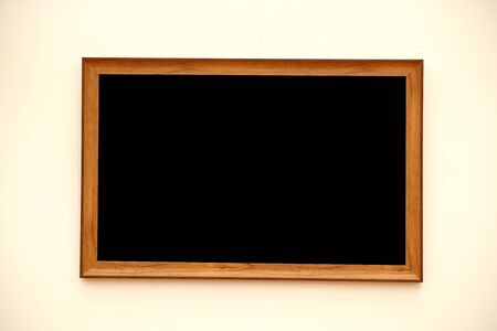 Wooden picture frame on an old retro flapの写真素材