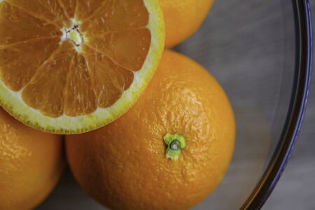 Oranges in a glass bowl prepare for make juiceの写真素材
