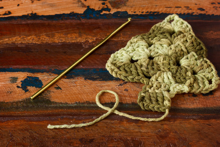 New year decoration with handmade green crochet christmas tree. Selective focusの写真素材