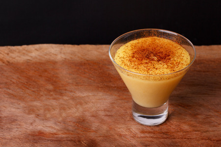 Brazilian sweet custard-like dessert curau de milho mousse of corn with cinnamon. Selective focusの写真素材