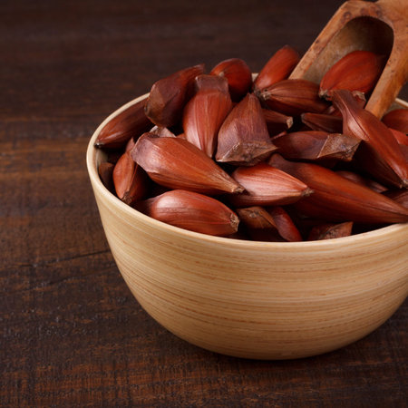 Pinhao - brazilian pine on wooden background. Selective focusの写真素材