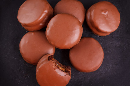 Brazilian honey cookie pao de mel on wooden background. Selective focusの写真素材
