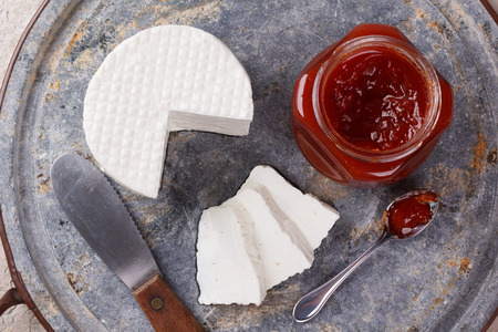 Brazilian dessert Romeo and Juliet, goiabada jam of guava and cheese Minas on gray board. Selective focusの写真素材