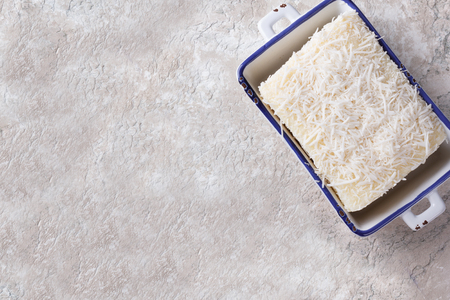 Sweet rice pudding with coconut on plate on marble table. Selective focusの写真素材