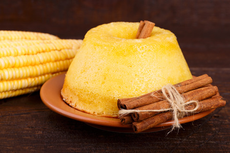 Brazilian sweet dessert corn cake with cinnamon. Selective focusの写真素材
