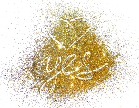 Word Yes and heart of golden glitter on white backgroundの写真素材