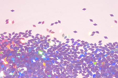 Textured background with decorative sequins on white