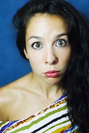 face of young beautiful woman on black backgroundの写真素材