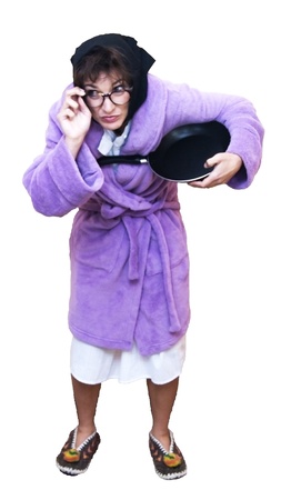 Old woman with frying panの写真素材