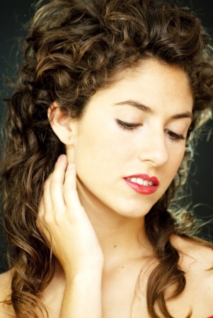 Portrait of an attractive woman on black backgroundの写真素材