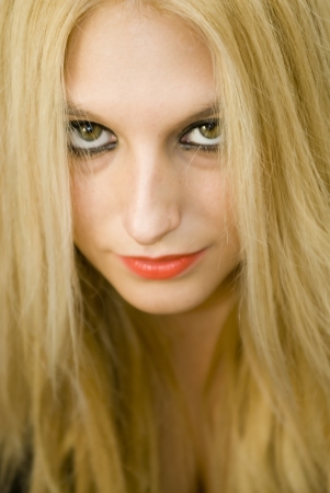 Backlit portrait of an attractive blonde womanの写真素材
