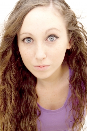 Pretty woman with blue eyes on white backgroundの写真素材