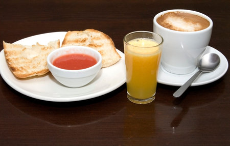 Breakfast with orange juice, coffee and toast
