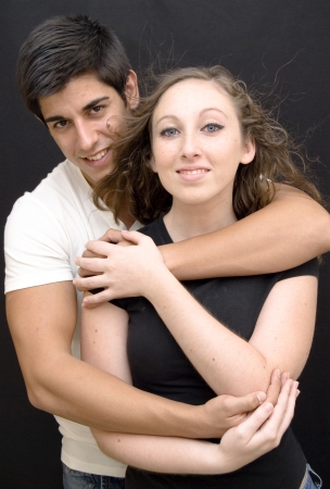 Young couple in love on black backgroundの写真素材