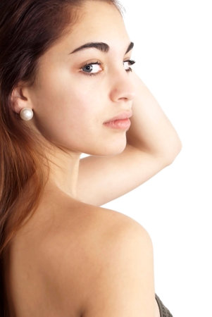 Beautiful girl with blue eyes over white の写真素材