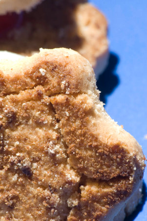 Lot of assorted cookies on blue background の写真素材