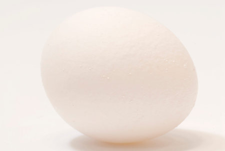 big white eggs over white background