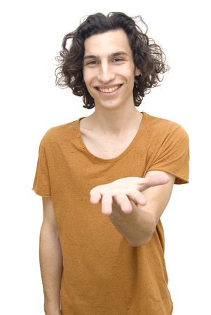 Handsome man with his open hand over white backgroundの写真素材