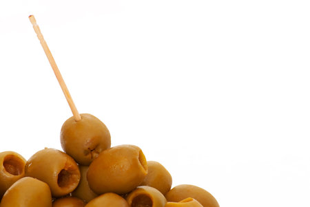 Raw olives without bones with toothpickの写真素材