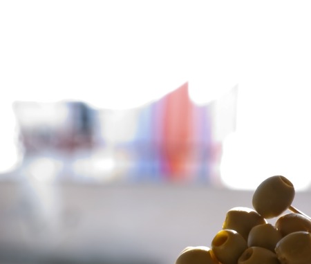 Raw olives without bones over white backgroundの写真素材