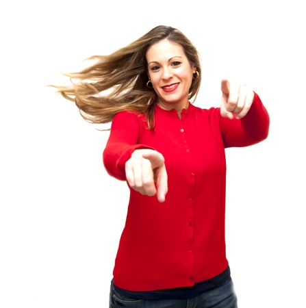 Portrait of Beautiful Young Woman Shaking Her Hair Over White Backgroundの写真素材