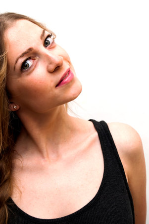 Portrait of Beautiful Young Woman Over White Backgroundの写真素材