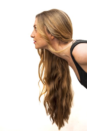 Portrait of Beautiful Young Woman Over White Backgroundの写真素材