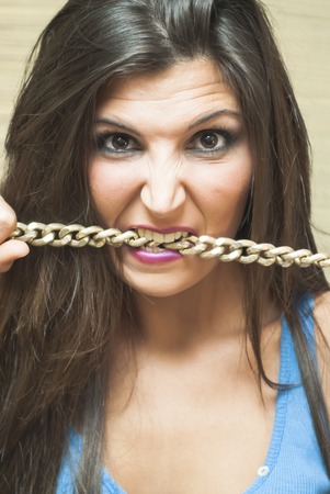 Portrait of Beautiful Young Woman with a necklaceの写真素材