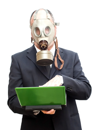 Businessman with gas mask over white vignettingの写真素材
