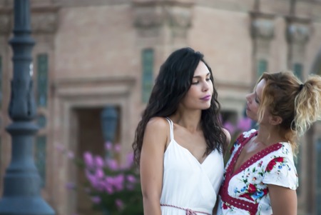 Portrait of Beautiful Young Woman and beautiful Middle Aged Woman  In The Park, that are mother and daughterの写真素材
