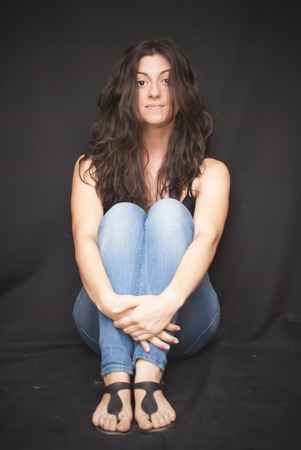 Portrait of Beautiful Young Woman Over White Backgroundの写真素材