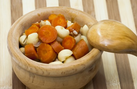 Vegetable soup with pasta, carrots and chickpeasの写真素材