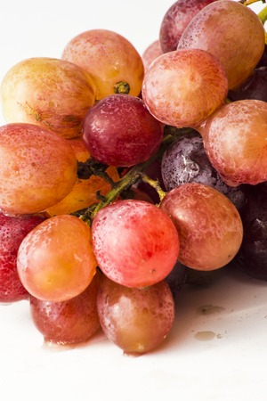 Tasty Bunch of grapes on white backgroundの写真素材