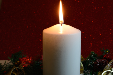 Beautiful Christmas Decorations With Lit Candleの写真素材