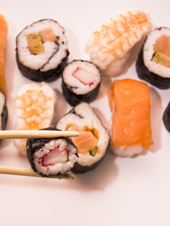 Tasty Pieces of sushi on white backgroundの写真素材