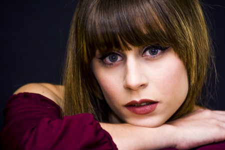 Beauty Woman Portrait Isolated over Black Backgroundの写真素材